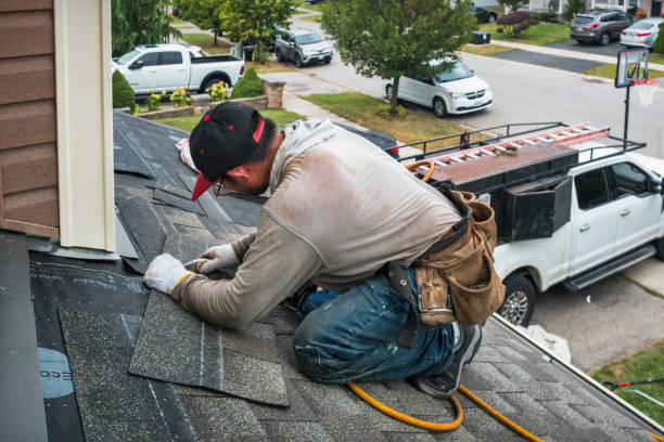 Professional Roofing technician working in Oakes, ND